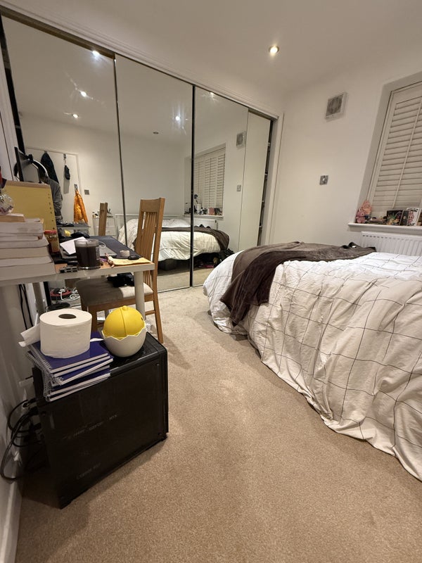 Photo 1: Bedroom, wardrobes behind the mirror