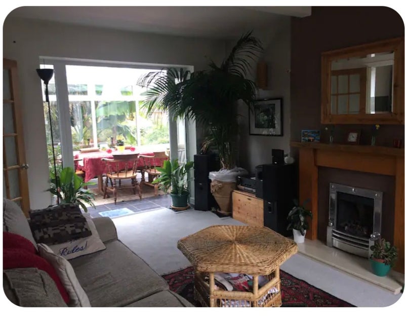 Photo 1: Family sitting room.