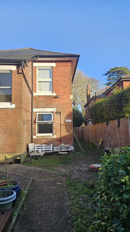 Photo 1: View from front of property with garden