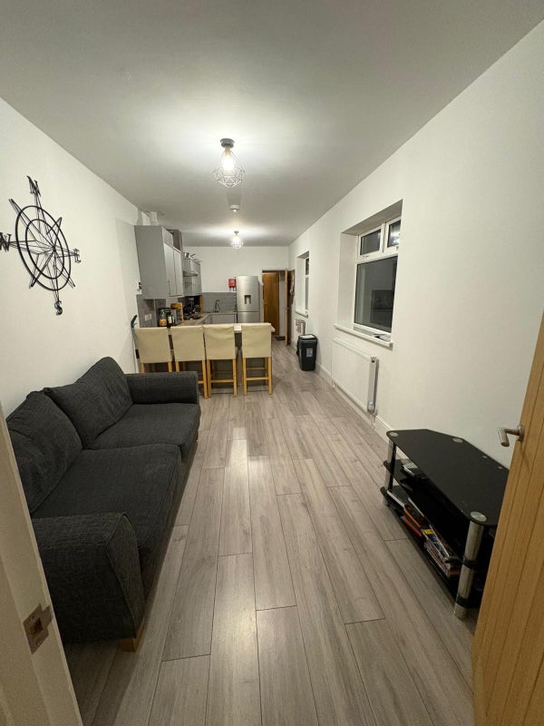 Photo 1: Large communal kitchen and living room