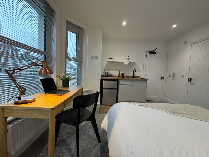 Photo 1: Desk with hardwired internet