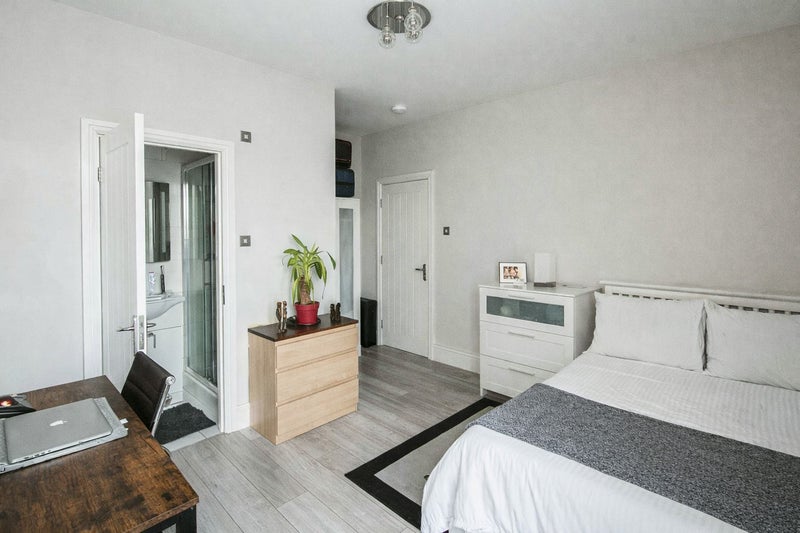 Photo 1: Ensuite Bedroom with Private Garden Access