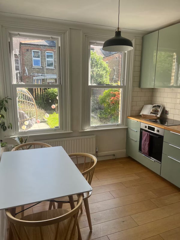 Photo 1: Kitchen leading on to garden