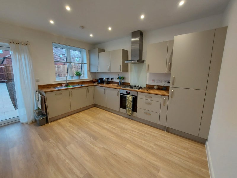 Photo 1: Kitchen has dishwasher, washing machine, fridge freezer, microwave, kettle and gas hob