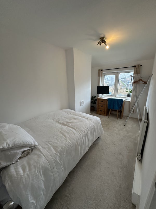 Photo 1: Bright and airy room