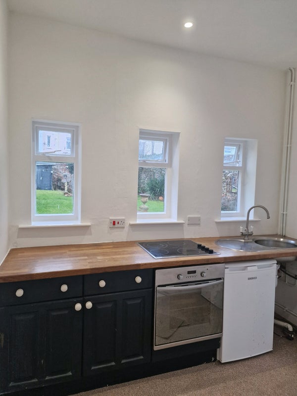 Photo 1: KITCHEN OVER LOOKING GARDEN