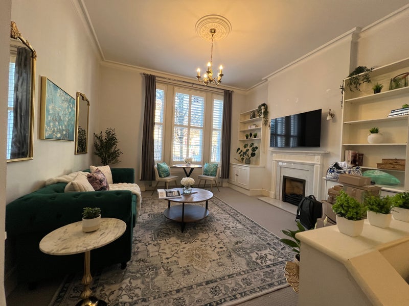 Photo 1: Spacious and bright living room with 18' high celing