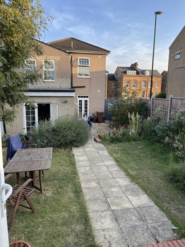 Photo 1: Garden / back of house