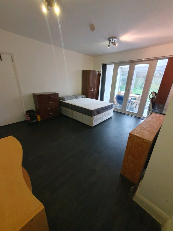 Photo 1: Double bedroom with private conservatory and access to garden