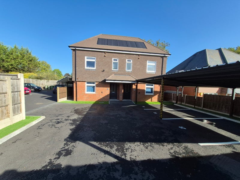 Photo 1: FRONTAGE AND PARKING  