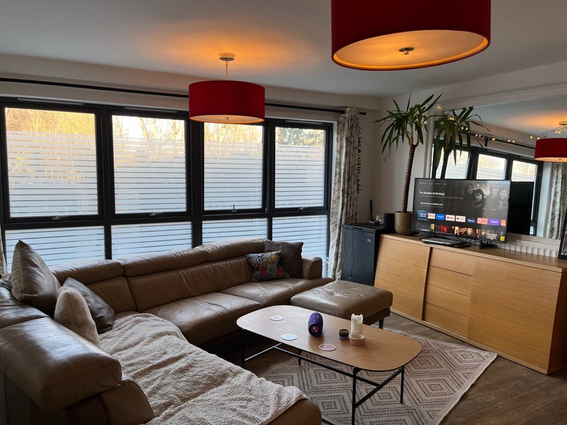 Photo 1: Open plan lounge/ breakfast bar/ kitchen overlooking the river 