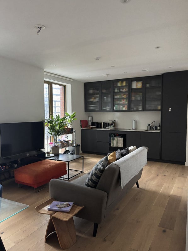 Photo 1: open plan living room and kitchen