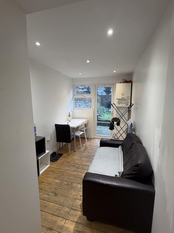 Photo 1: living room w garden access