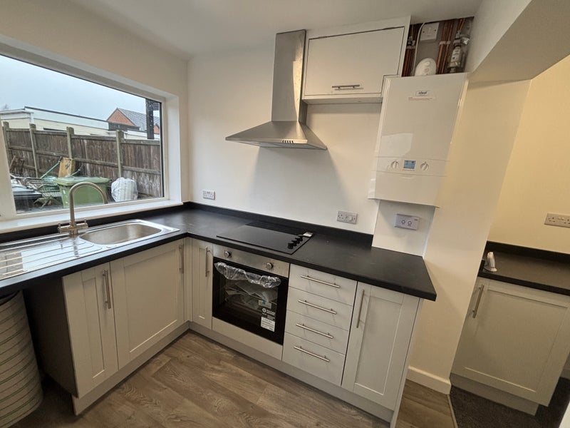 Photo 1: New open plan kitchen