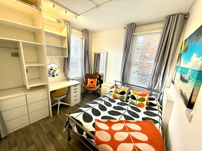 Photo 1: Room 3 (Ground floor double aspect room with lots of storage