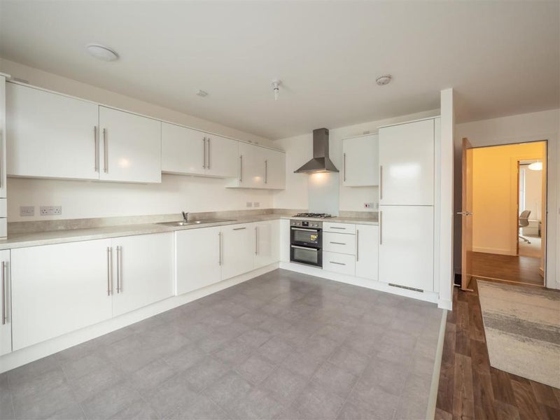 Photo 1: Open kitchen