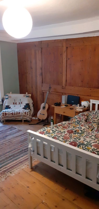 Photo 1: Georgian wood panelled bedroom