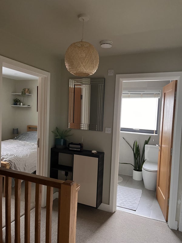 Photo 1: Upstairs hallway