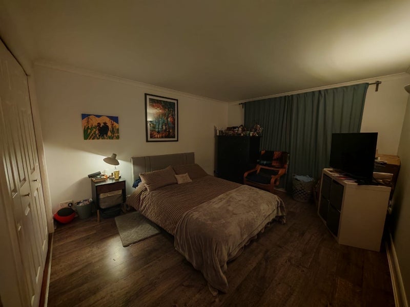 Photo 1: Bedroom with tv