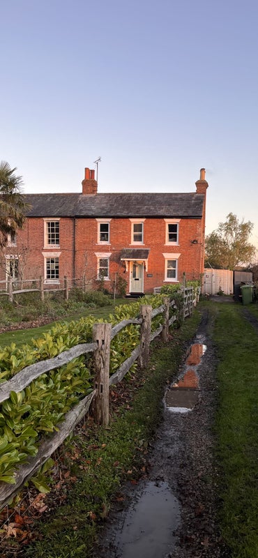 Photo 1: Semi rural home