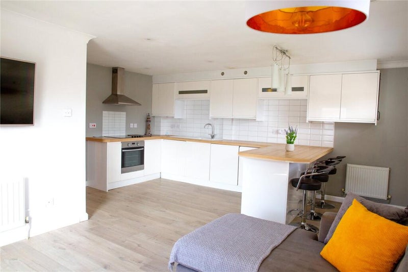 Photo 1: Kitchen Area