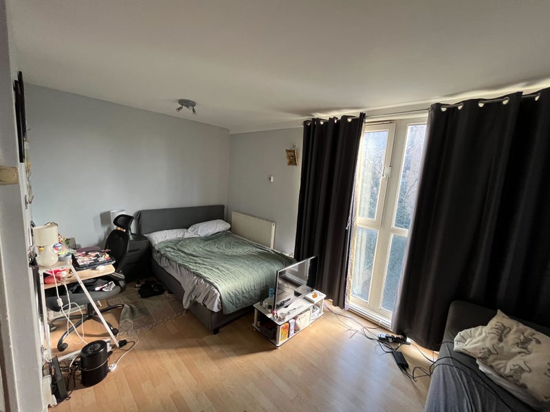 Photo 1: Double Bed with Large Windows 