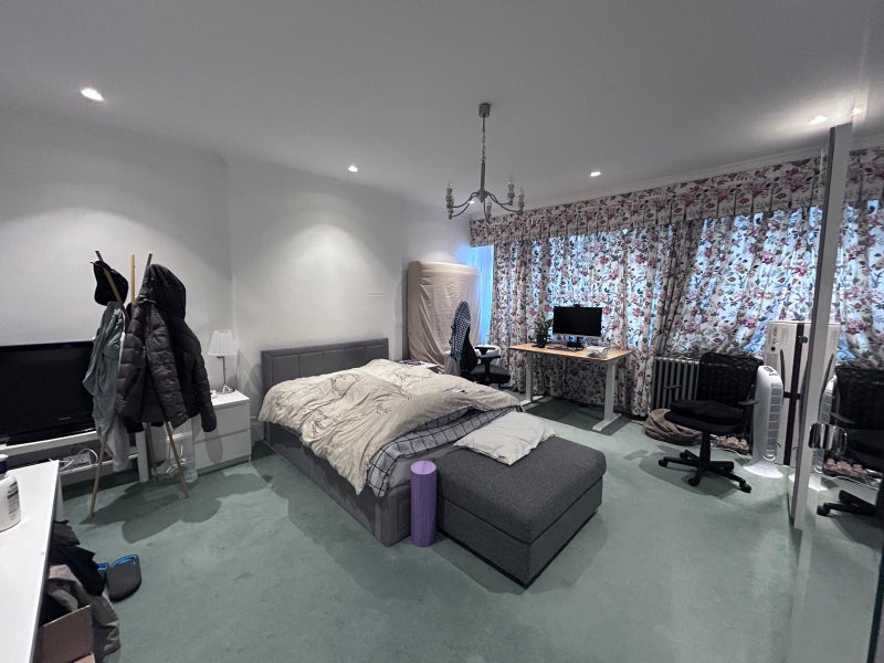 Photo 1: Large bedroom with an ottoman double bed, two wardrobes, chest od drawers, desk and two bedsides