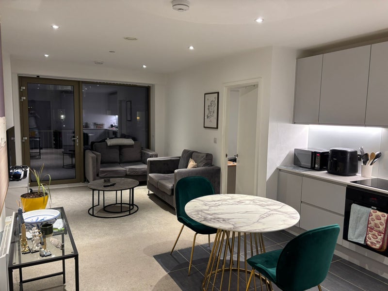 Photo 1: Shared Living room / Kitchen