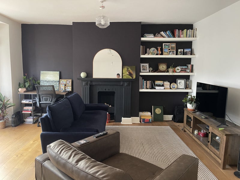 Photo 1: Spacious living room (not pictured: large dining table)