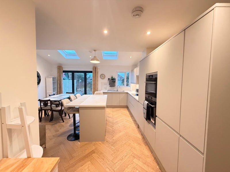 Photo 1: Kitchen and dining area