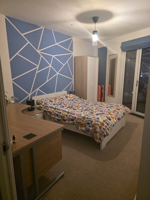 Photo 1: The available bedroom