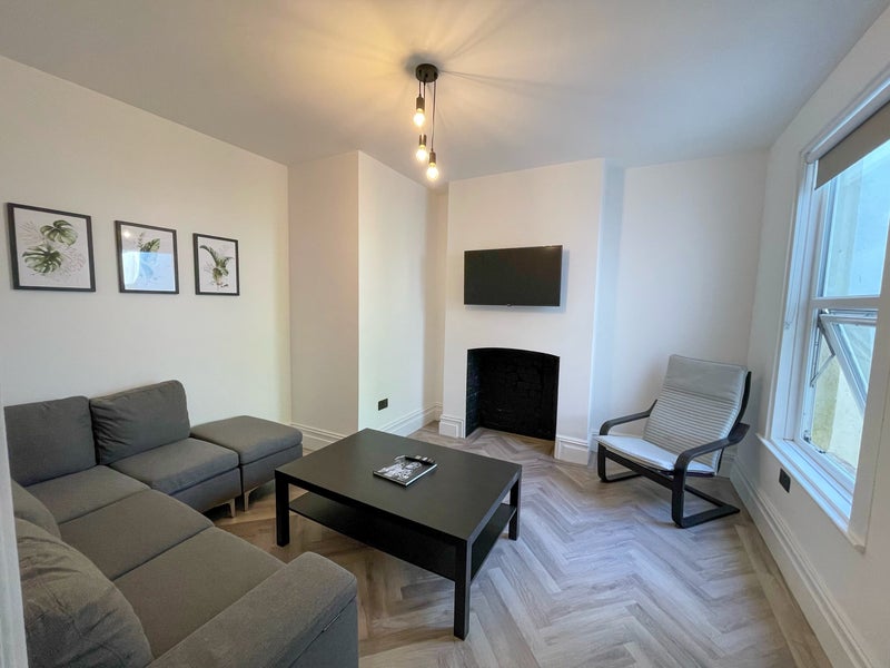 Photo 1: Communal Lounge