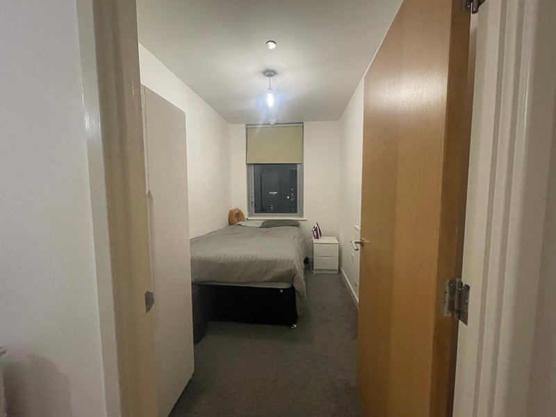 Photo 1: Double bed with a window (view from corridor) 