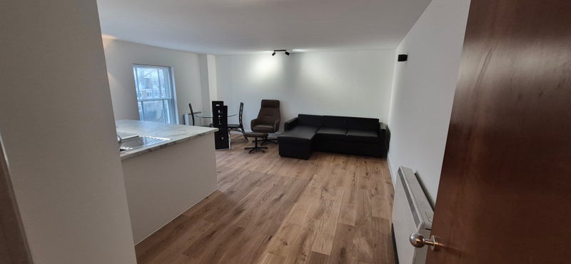 Photo 1: Oen plan kitchen and reception