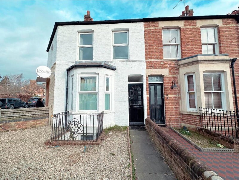 Photo 1: Front of house