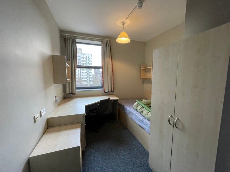 Photo 1: Bright south-west facing. Fifth floor.