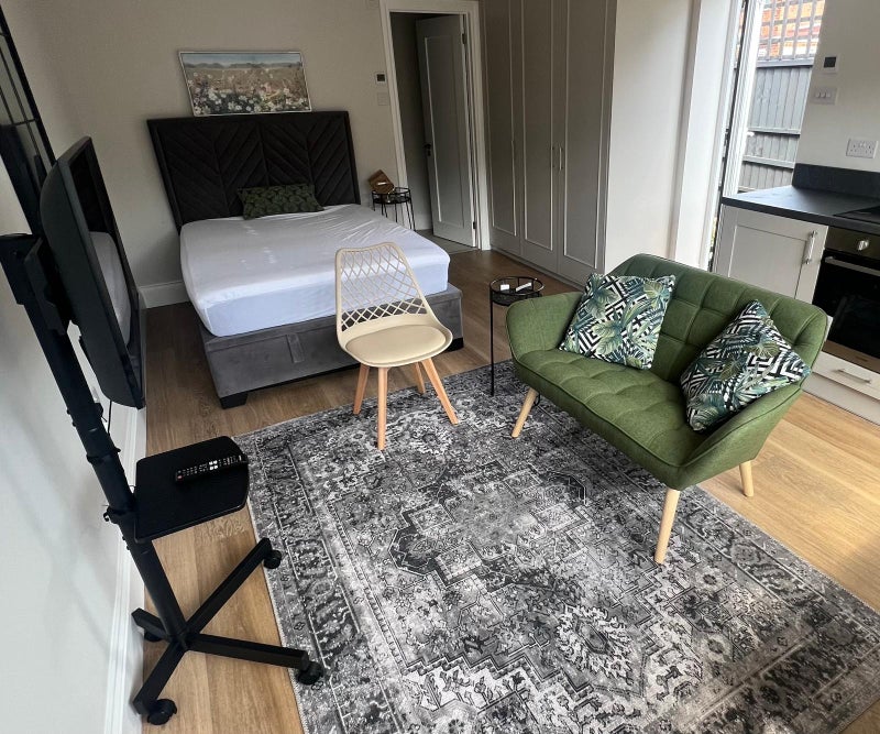 Photo 1: Bedroom and living area