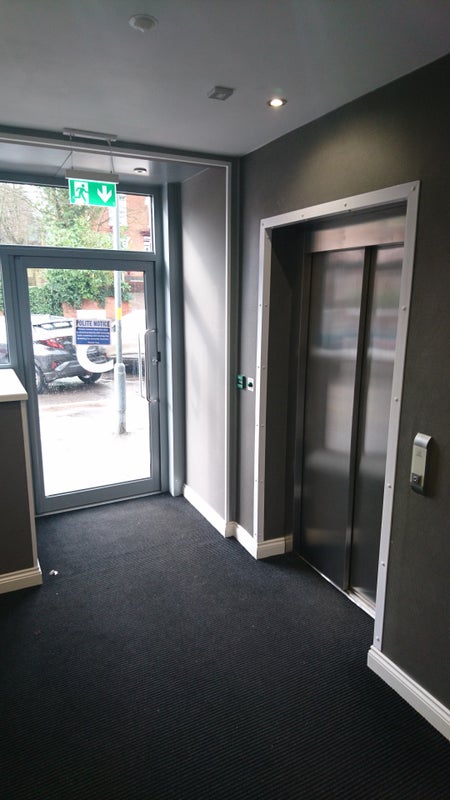 Photo 1: Reception/Lift