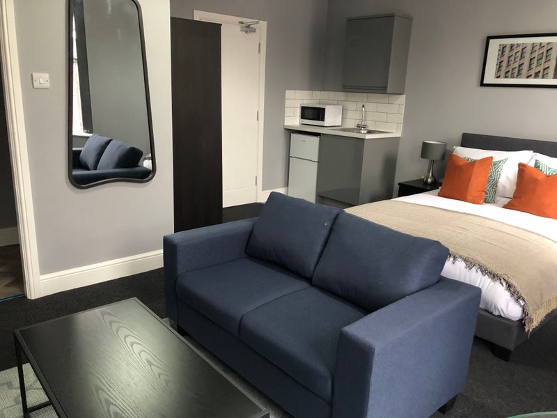 Photo 1: Lounge & Kitchenette