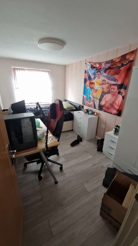 Photo 1: Room has since been painted blue.