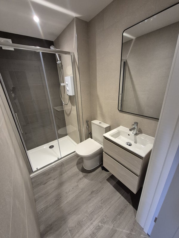 Photo 1: SHOWER ROOM - 2 X DOUBLES SHARE 