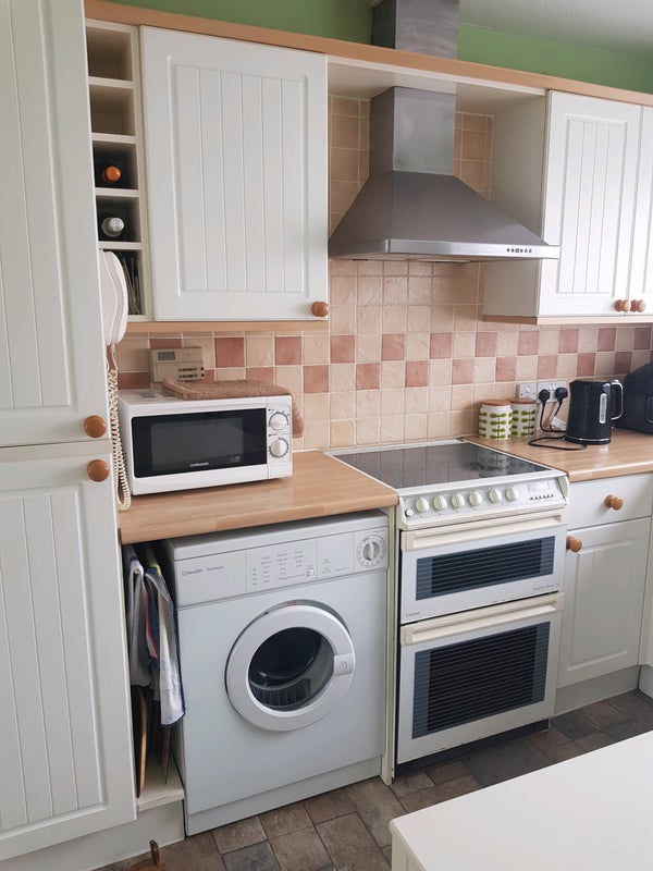 Photo 1: Washing machine gas cooker & tv