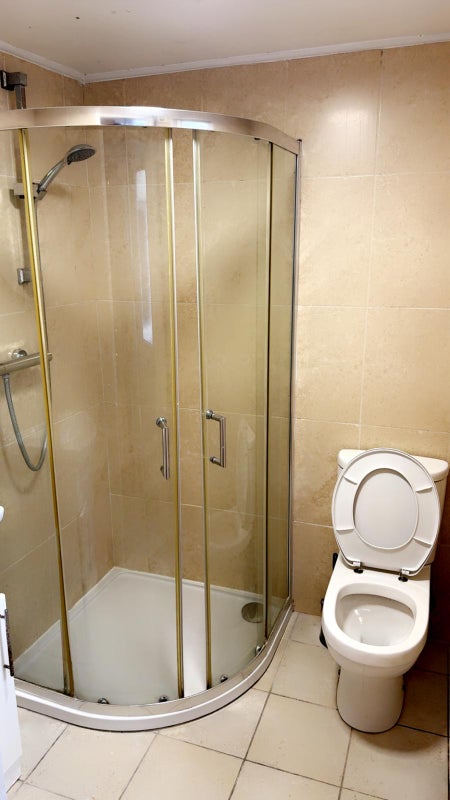 Photo 1: Shared Shower 