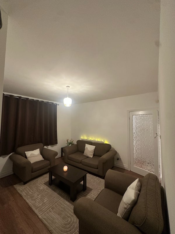 Photo 1: Shared living space 