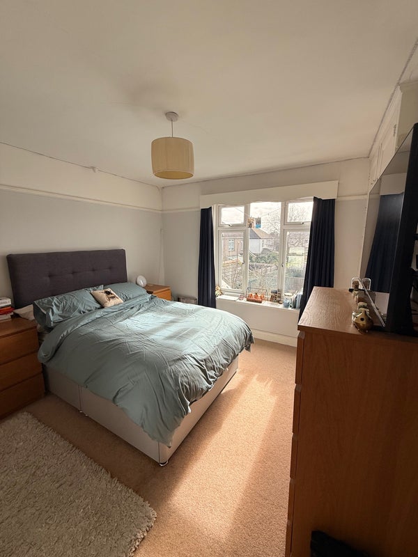 Photo 1: Upstairs garden-facing bedroom (available)