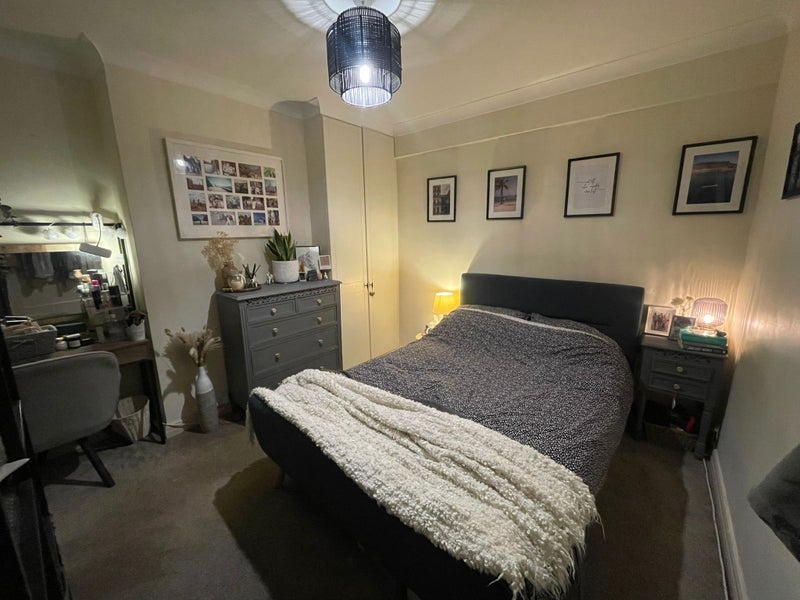 Photo 1: Double bedroom with built in storage