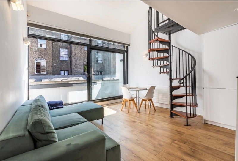 Photo 1: shared living area with balcony