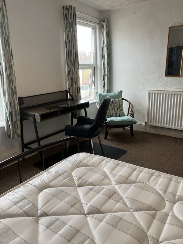 Photo 1: Desk area and cosy corner