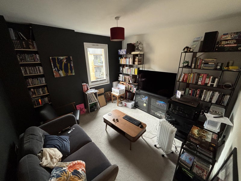 Photo 1: Currently used as a media room, will be emptied