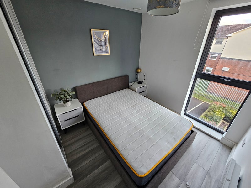 Photo 1: Your bedroom, double bed, built in wardrobe, electrical sockets each side of the bed, and by the win